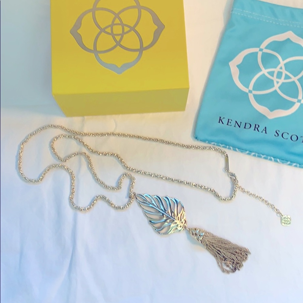 Kendra Scott gold long necklace with leaf tassel